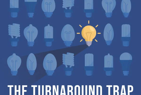 Front cover of the report on school turnaround called "The Turnaround Trap: why Quick Fixes Fail Students" showing dim lightbulbs with one bright lightbulb to signify a new approach and strategy for turnaround.